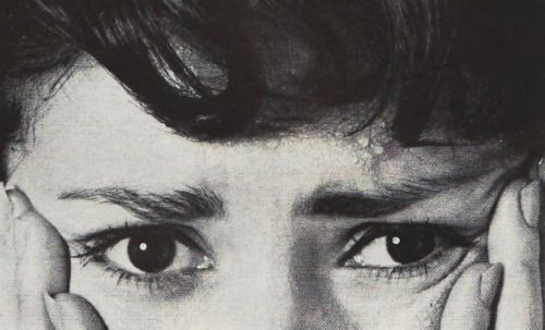 photo of mid century womans anxious eyes