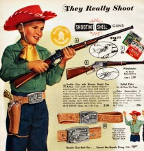 vintage picture boy as cowboy and gun