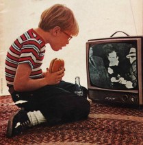 boy watching TV as Oswald shot