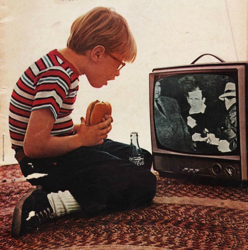 boy watching TV as Oswald shot