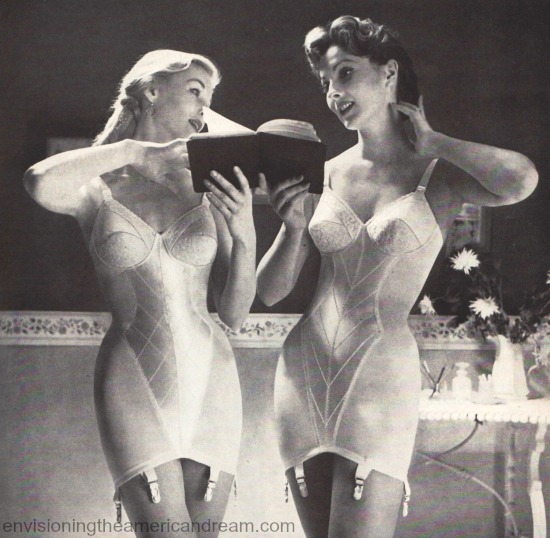 vintage image 2 1950 women in girdles reading a book 