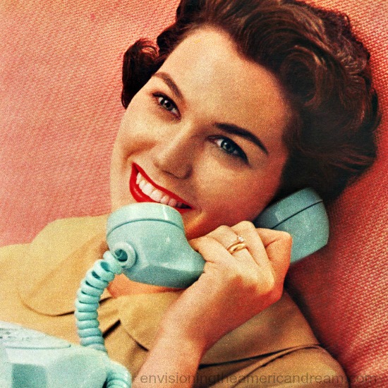 1950s Housewife taliing on telephone