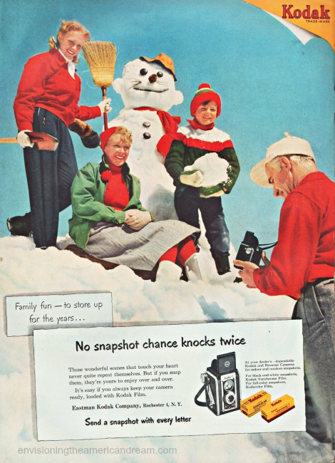 1950s happy family making a snowman Kodak ad