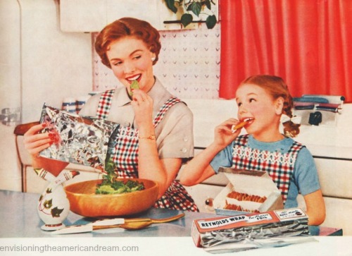 vintage motherand daughter in kitchen 1950s