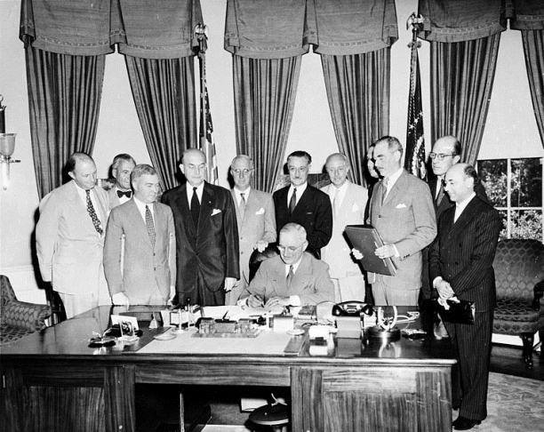 Truman signing NATO agreement